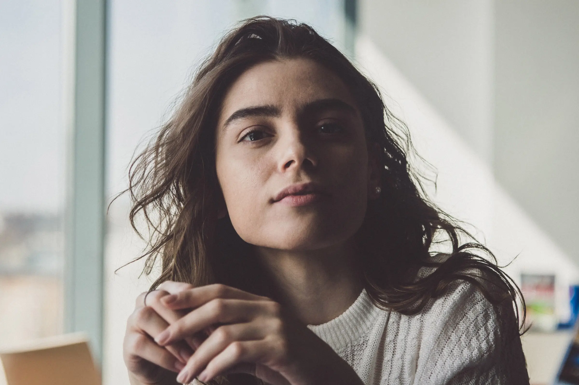 Woman looking cool showing her hands